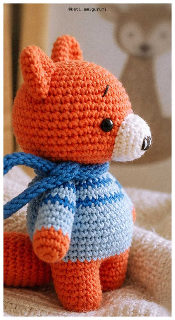 crochet little fox amigurumi free pattern cute handmade fox toy wearing blue scarf soft yarn detail