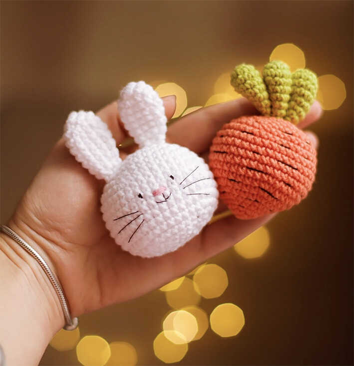 small crochet bunny and carrot amigurumi held in hand cute handmade easter toy set