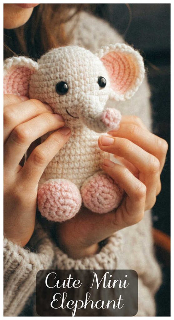 small crochet elephant amigurumi held in hands cute handmade elephant doll gift idea