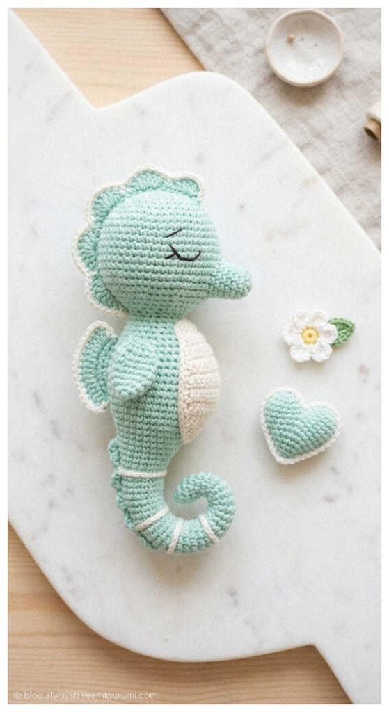 sleeping seahorse amigurumi crochet doll with small heart accessory cute handmade ocean crochet toy