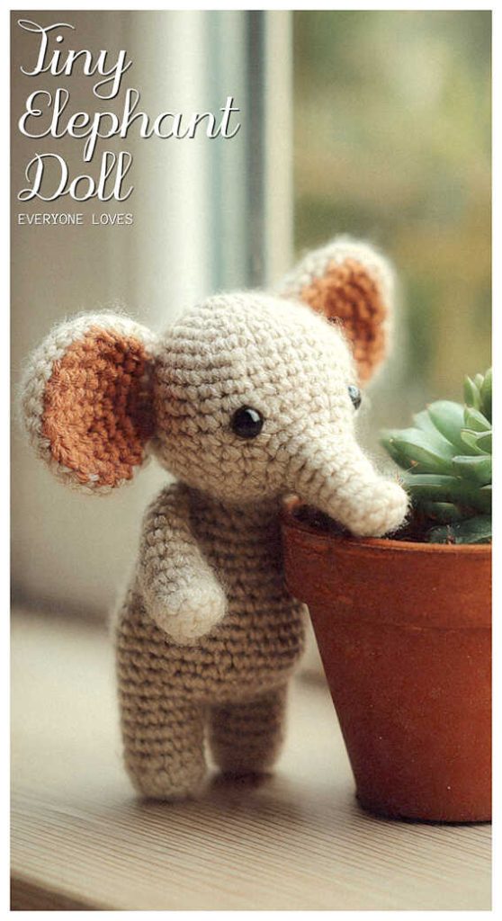 tiny crochet elephant amigurumi next to a plant cute handmade elephant toy home decor