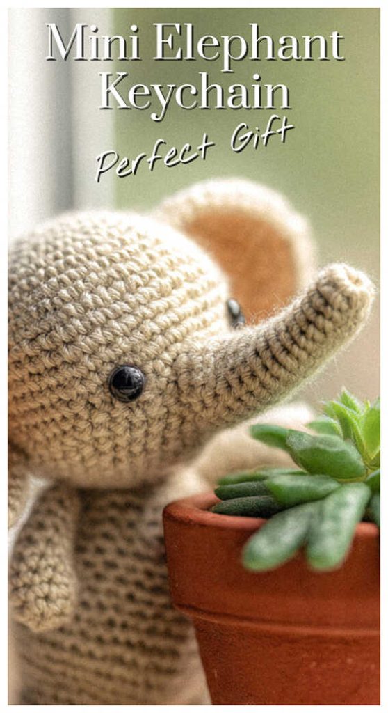 mini crochet elephant keychain amigurumi next to a plant cute handmade elephant gift idea