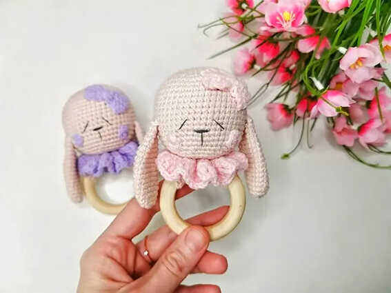 crochet bunny baby rattle in hand free crochet pattern handmade baby toy with wooden ring