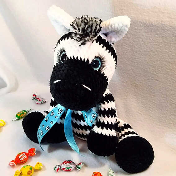 crochet zebra amigurumi side view free crochet pattern cute handmade zebra plush toy with stripes and ribbon