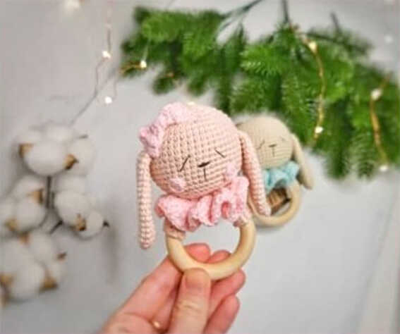 handheld crochet bunny baby rattle free crochet pattern handmade bunny toy with wooden ring