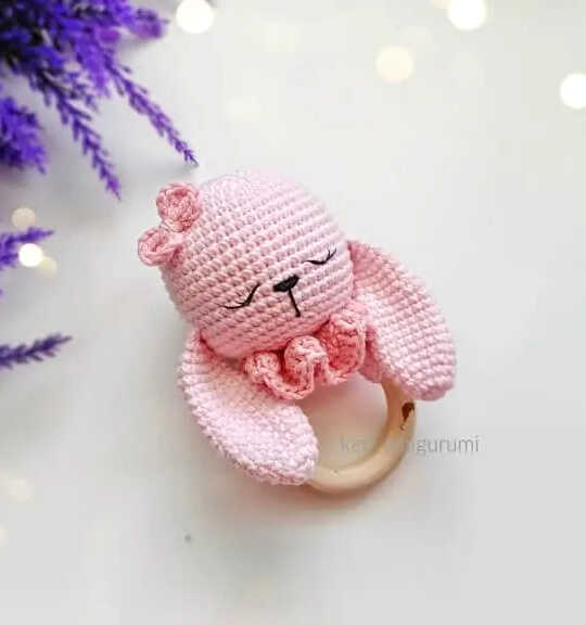 pink crochet bunny baby rattle free crochet pattern handmade bunny toy with wooden ring