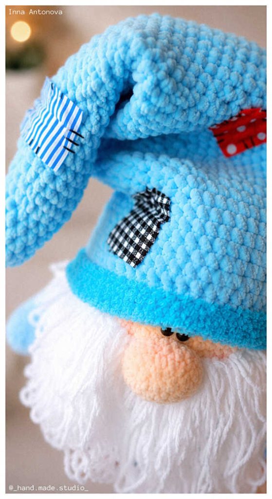 cute crochet gnome amigurumi free pattern plush handmade gnome doll close up with long blue hat