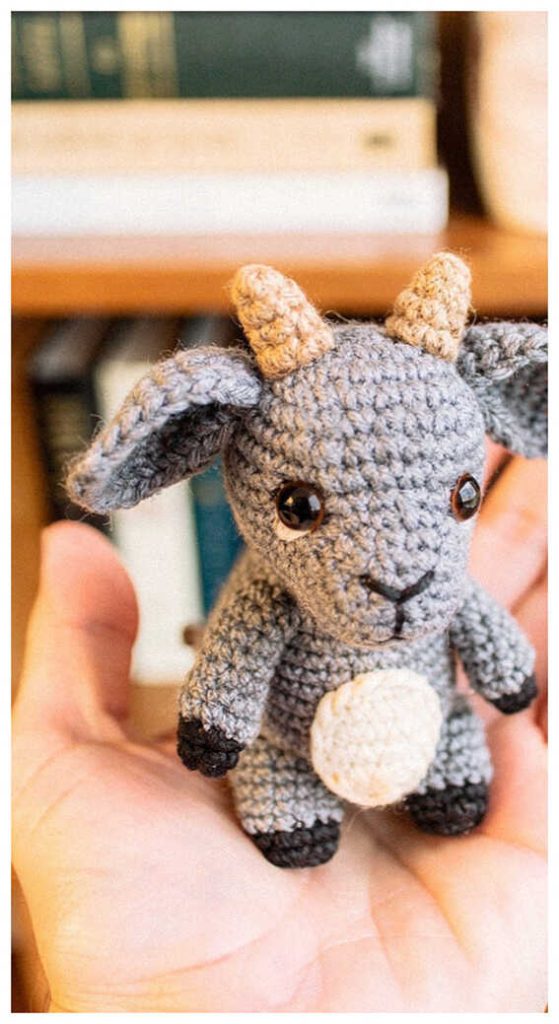 mini goat doll amigurumi handmade crochet farm animal toy inspiration held in hand
