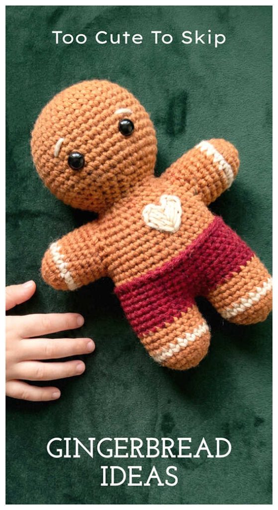 Gingerbread man amigurumi crochet plush toy held in hand